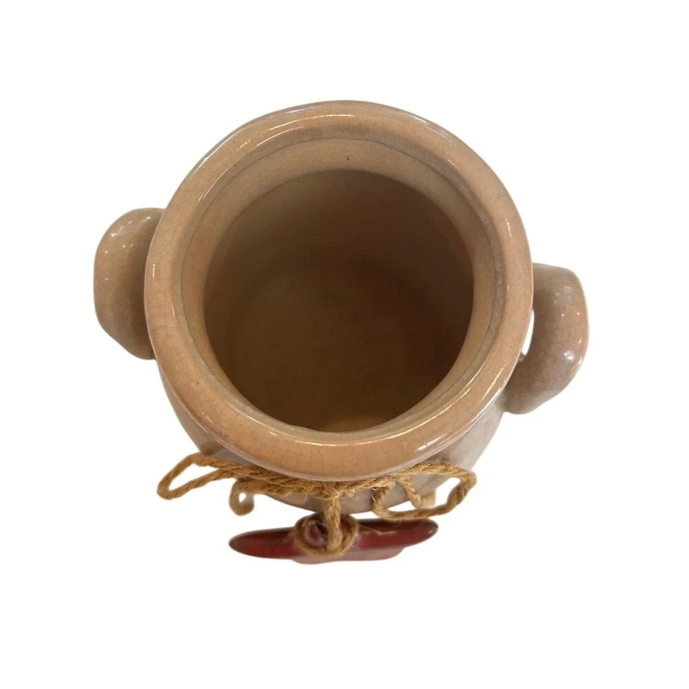 Farm house brown glazed ceramic jug with ceramic star.‎